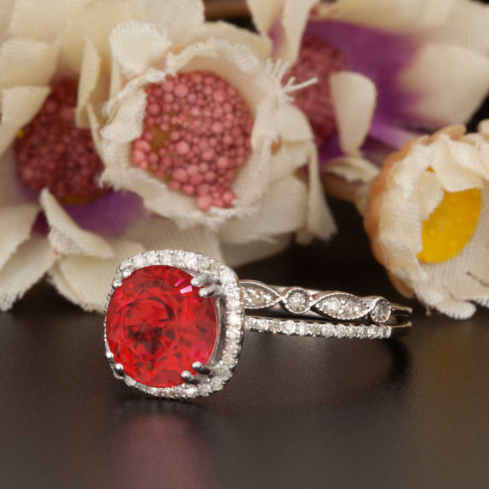 1.5 Carat Cushion Cut Halo Ruby and Diamond Ring with Classic Wedding Band in 9k White Gold