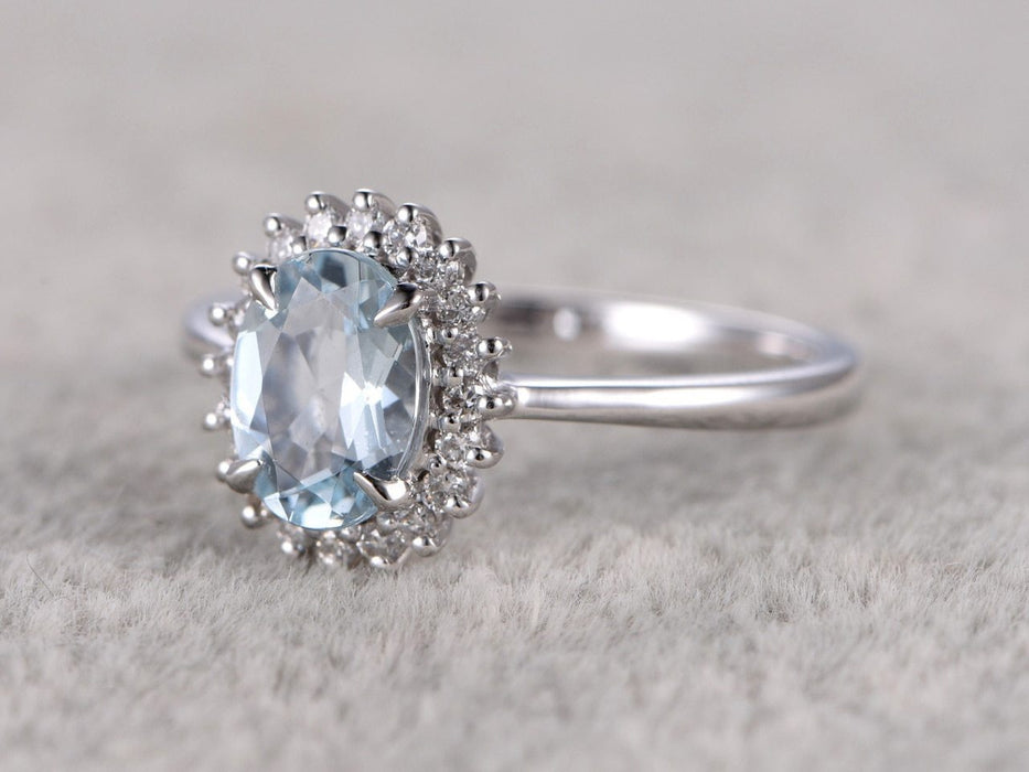 Halo 1.25 Carat Oval cut Aquamarine and Diamond Engagement Ring in White Gold