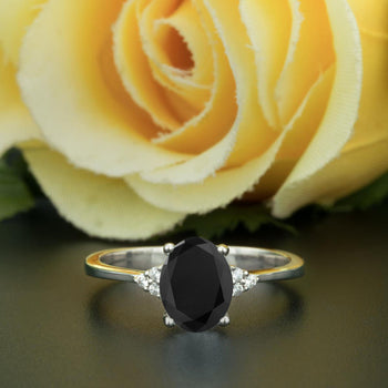 1.25 Carat Oval Cut Black Diamond and Diamond Engagement Ring in White Gold Elegant Ring