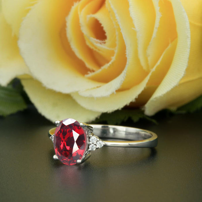 1.25 Carat Oval Cut Ruby and Diamond Engagement Ring in 9k White Gold Elegant Ring