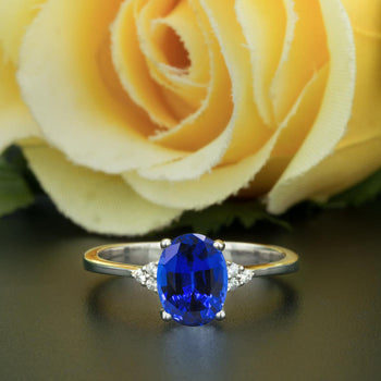 1.25 Carat Oval Cut Sapphire and Diamond Engagement Ring in White Gold Elegant Ring