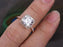 2 Carat Cushion Cut Moissanite and Diamond Halo Engagement Ring in Rose Gold