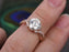 1.25 Carat Infinity Round Cut Moissanite and Diamond Wedding Ring in Rose Gold