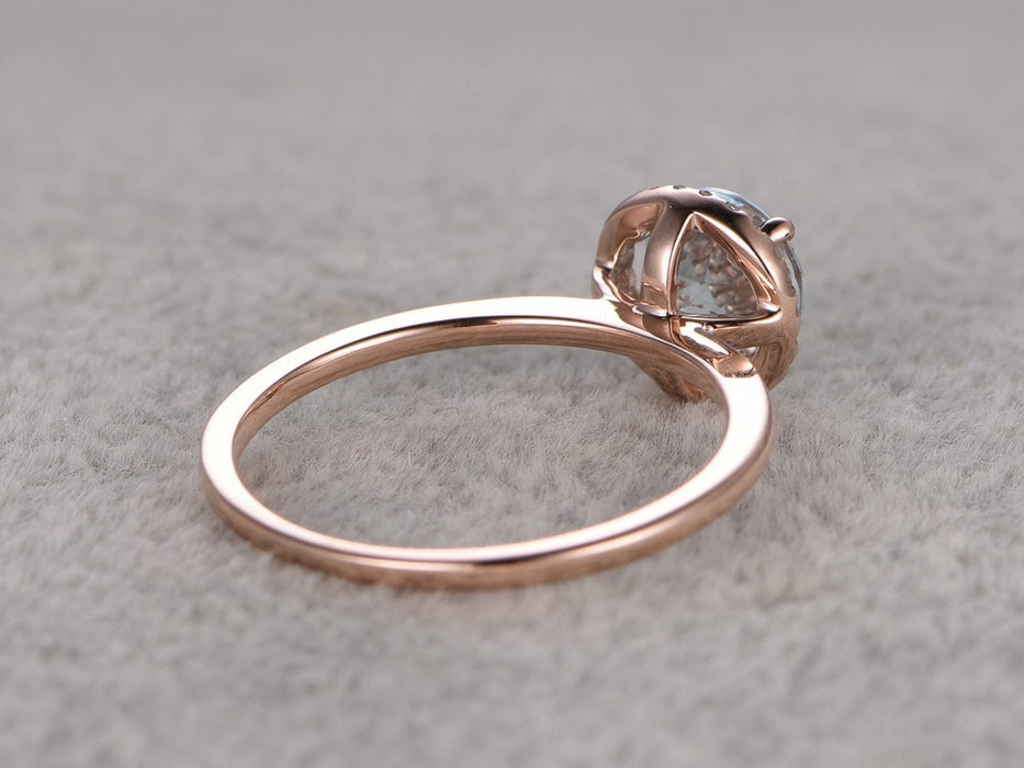 1.25 Carat Round Cut Aquamarine and diamond Engagement Ring in Rose Gold