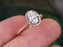 1.50 Carat Oval Cut Moissanite and Diamond Halo Engagement Ring in 9k Rose Gold