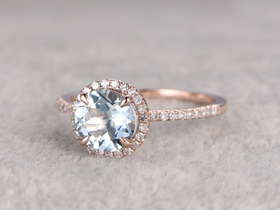 1.50 Carat Round Cut Aquamarine and Diamond Halo Engagement Ring in Rose Gold
