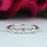 0.25 Carat Five Stones Parisian Wedding Band in White Gold over Sterling Silver