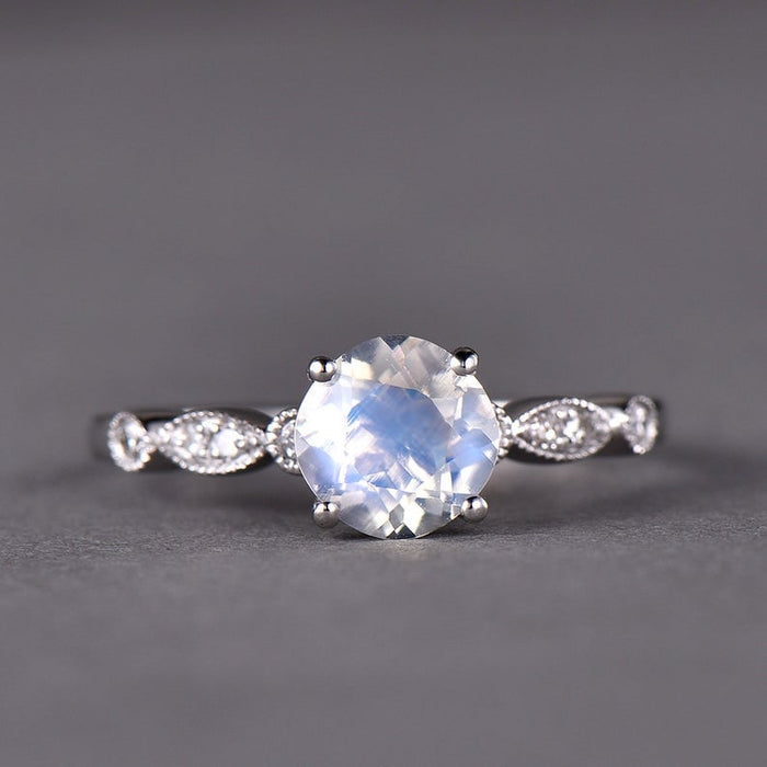 Art Deco 1.25 Carat Round Cut Blue Moonstone and Diamond Classic Engagement Ring in White Gold