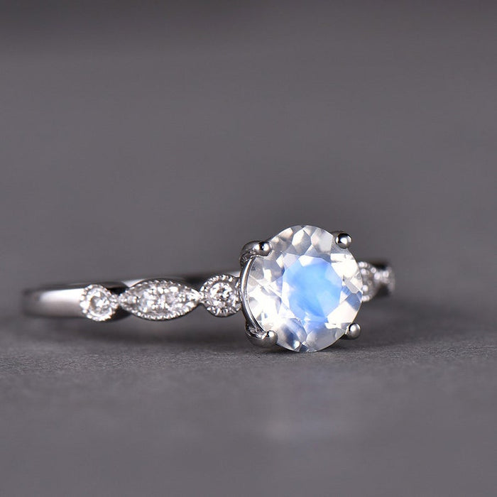 Art Deco 1.25 Carat Round Cut Blue Moonstone and Diamond Classic Engagement Ring in White Gold