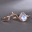Antique 1.50 Carat Pear Shape Rainbow Moonstone and Diamond Halo Wedding Set in Rose Gold