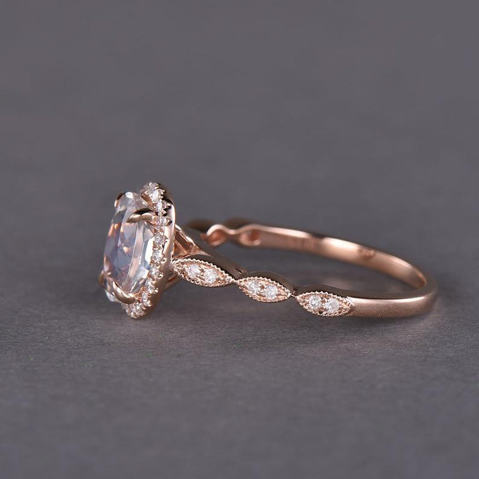 Classic Art Deco 1.50 Carat Oval Cut Rainbow Moonstone and Diamond Halo Engagement Ring in Rose Gold