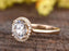 1.25 Carat Round Cut Halo Moissanite and Diamond Engagement Ring in Yellow Gold