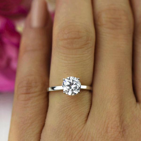 Four Prongs 1.5 Catat Round Cut Solitaire Engagement Ring in White Gold over Sterling Silver