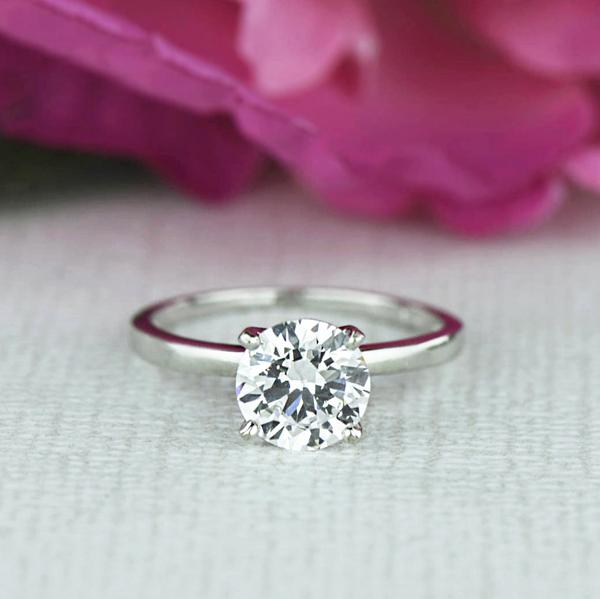 Four Prongs 1.5 Catat Round Cut Solitaire Engagement Ring in White Gold over Sterling Silver