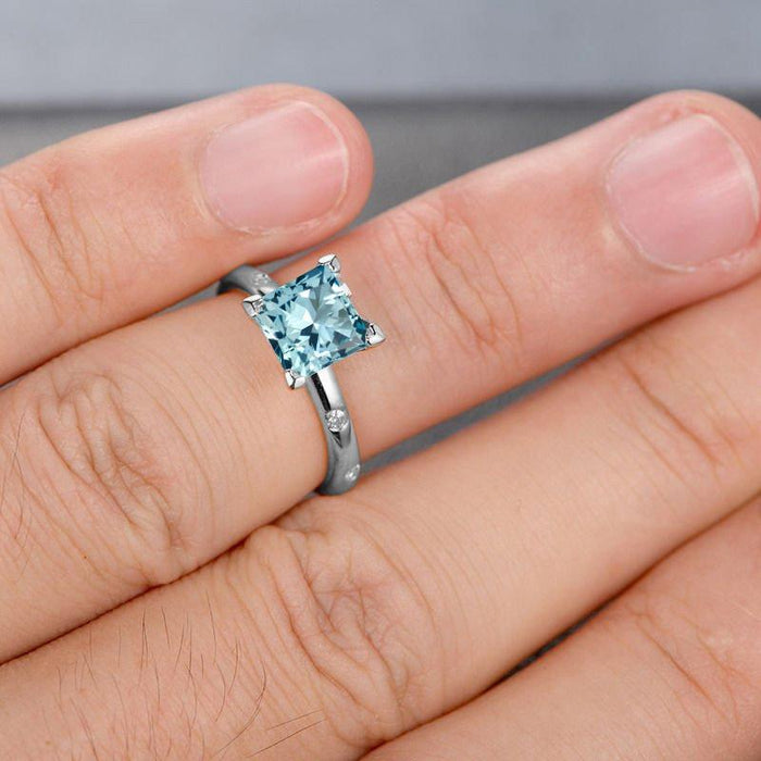 1.25 Carat Princess Cut Aquamarine and Diamond solitaire Engagement Ring in White Gold
