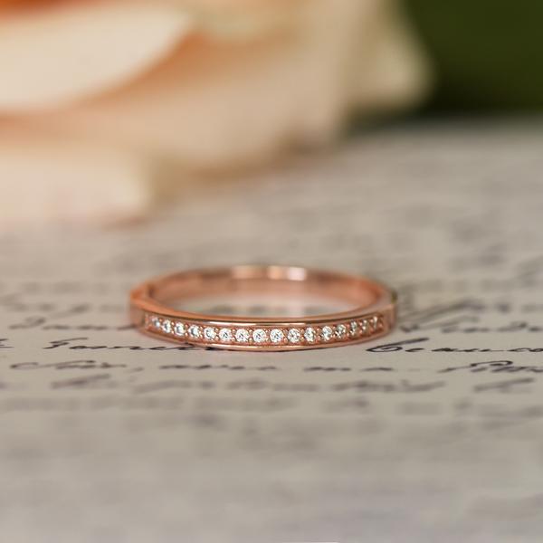 0.25 Carat Small Channel Half Eternity Wedding Band in Rose Gold over Sterling Silver