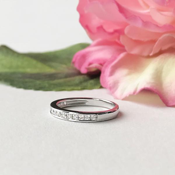 0.25 Carat Princess Channel Half Eternity Wedding Band in White Gold over Sterling Silver