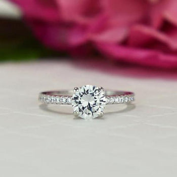 1.25 Carat Round Cut Accented Enagagement Ring in White Gold over Sterling Silver