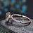 1.25 Carat oval cut Aquamarine and Diamond Halo Wedding Ring in Rose Gold