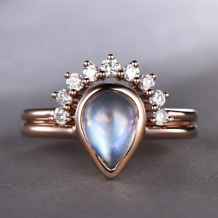 Bezel 1.25 Carat Pear Shape Blue Moonstone and Diamond Wedding Set with Crown Band in Rose Gold