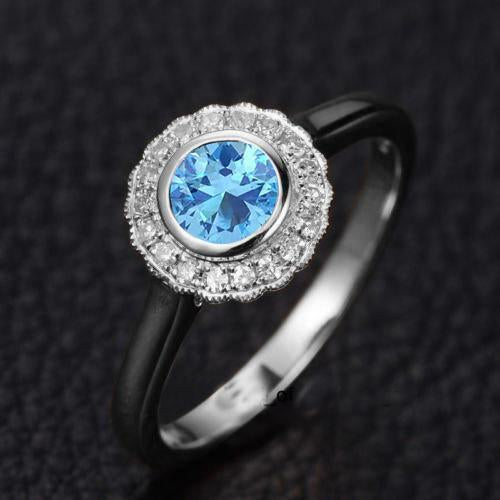 Antique design 1.25 Carat Round cut Aquamarine and Diamond Halo Engagement Ring in White Gold