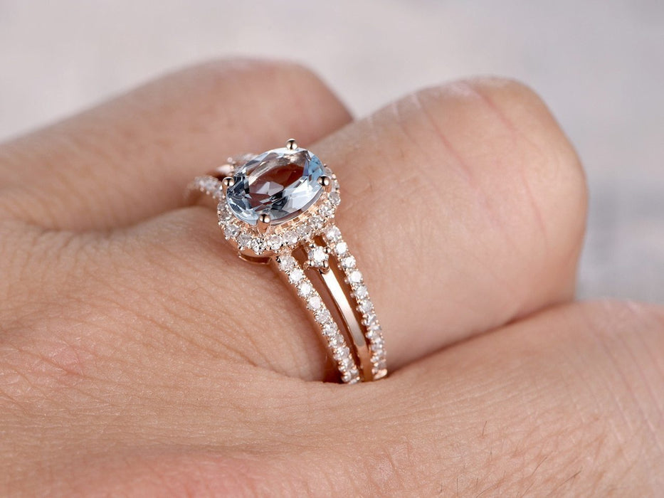 Split shank 1.50 Carat Aquamarine and Diamond Halo Engagement Ring in Rose Gold