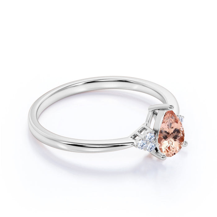 1.50 Carat Pear Shaped Pink Morganite with Diamond Shoulder Accents Cluster Wedding Ring in Rose Gold