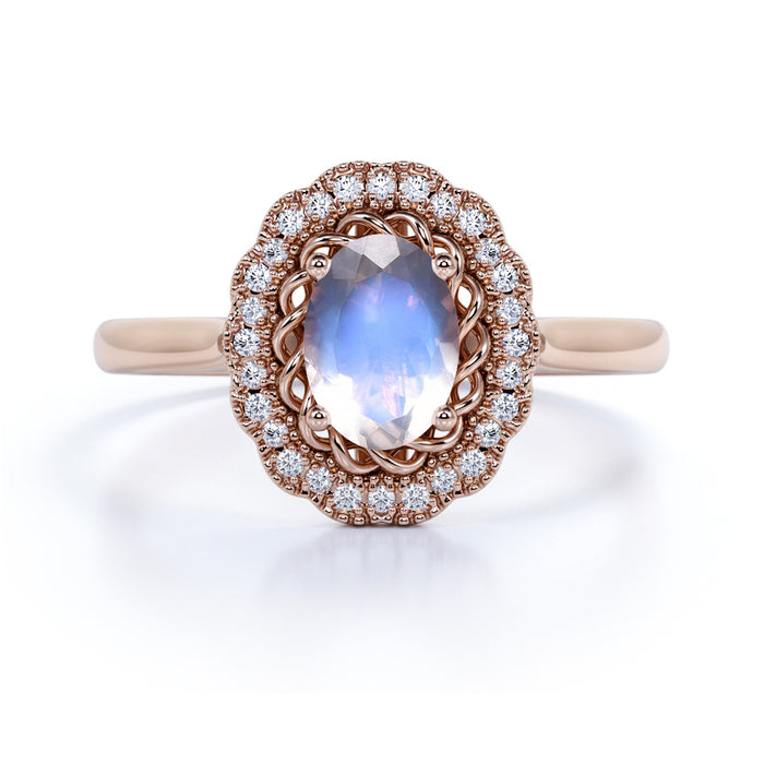 1.50 Carat Antique Oval Blue Moonstone & Diamond Vintage Engagement Ring in Rose Gold