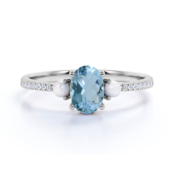 Antique .95 Carat Oval Aquamarine, Pearl & Diamond Three Stone Wedding Ring in White Gold