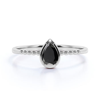 Modern Bezel Set Pear Shaped Black Diamond Minimalist Solitaire Engagement Ring in White Gold
