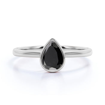 1 Carat Minimalist Bezel Set Pear Shaped Black Diamond Solitaire Engagement Ring in White Gold