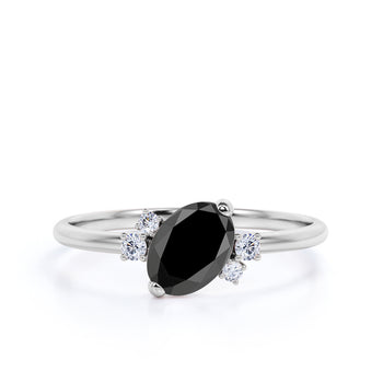 1.50 Carat Oval Cut Black Diamond and White Diamond Accents Cluster Engagement Ring in White Gold