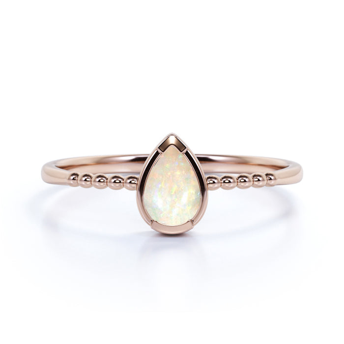 Modern Bezel Set Pear Shaped Fire Opal Minimalist Solitaire Engagement Ring in Rose Gold