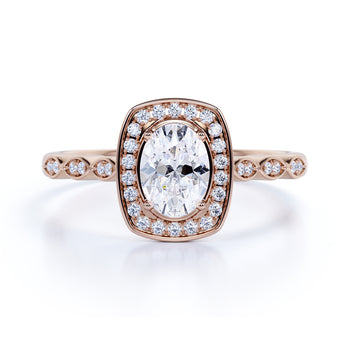 Vintage 1.5 Carat Bezel Set Oval Fire Moissanite & Diamond Halo Engagement Ring in Rose Gold