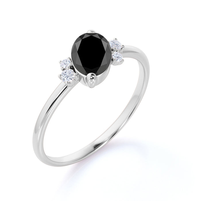 1.50 Carat Oval Cut Black Diamond and White Diamond Accents Cluster Engagement Ring in White Gold