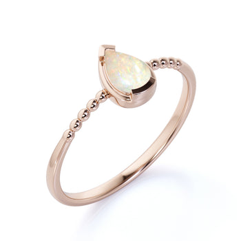 Modern Bezel Set Pear Shaped Fire Opal Minimalist Solitaire Engagement Ring in Rose Gold