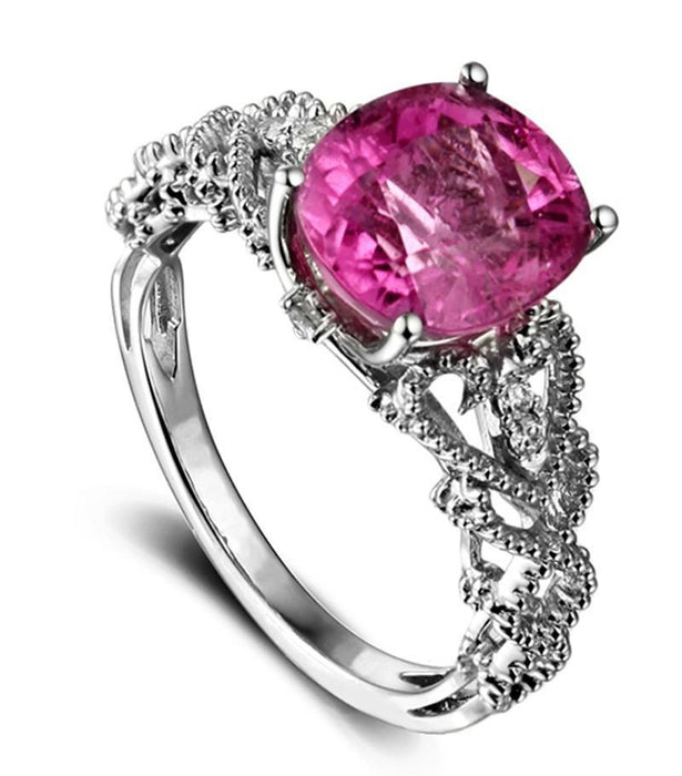 Antique 1.50 Carat Ruby and Diamond Halo Engagement Ring