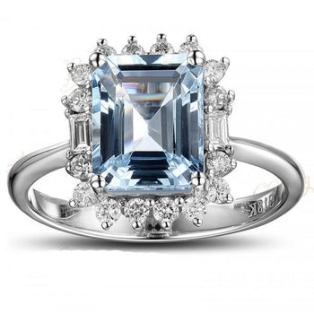 Beautiful 1.50 Carat blue topaz and diamond halo engagement ring