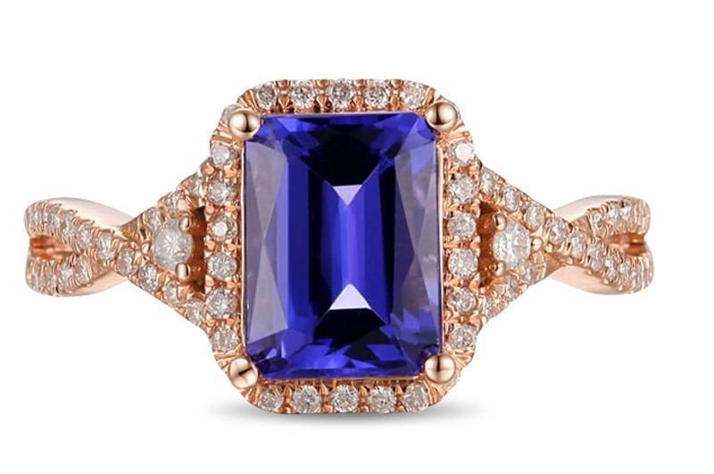 Beautiful 2 Carat Emerald Cut Blue Sapphire and Diamond Engagement Ring
