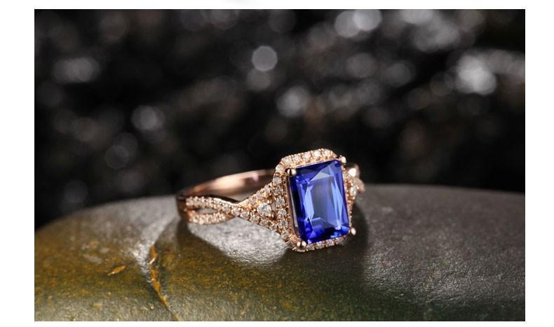Beautiful 2 Carat Emerald Cut Blue Sapphire and Diamond Engagement Ring