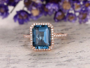 1.50 Carat Emerald Cut London Blue Topaz and Diamond Halo Half Infinity Engagement Ring in Rose Gold