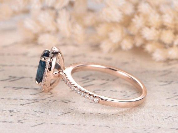 1.50 Carat Oval London Blue Topaz and Diamond Halo Claw Prong Engagement Ring in Rose Gold