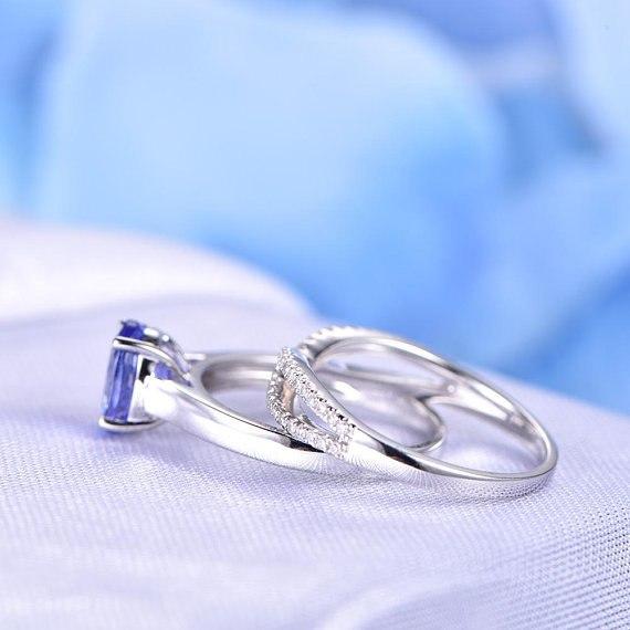 1.50 Carat Oval Cut Tanzanite and Diamond Infinity Design Wedding Ring Set in White Gold