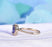 1.50 Carat Halo Oval Cut Tanzanite Diamond Half Infinity Engagement Rings in Yellow Gold