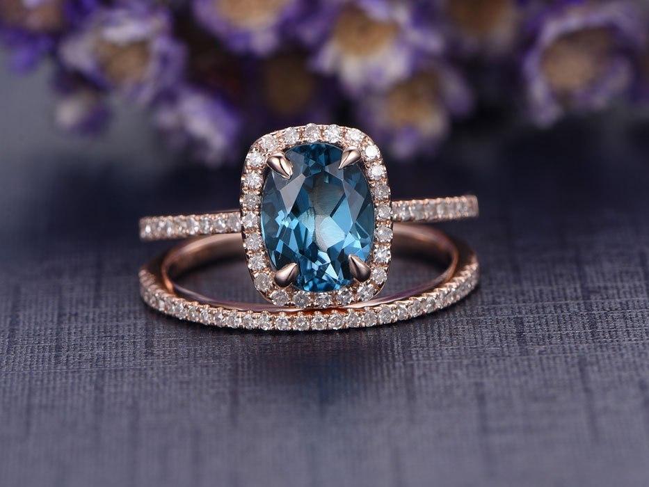 2 Carat Oval Cut London Blue Topaz and Diamond Halo Wedding Ring Set in Rose Gold