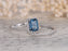 1.50 Carat Emerald Cut London Blue Topaz and Diamond Halo Engagement Ring in White Gold