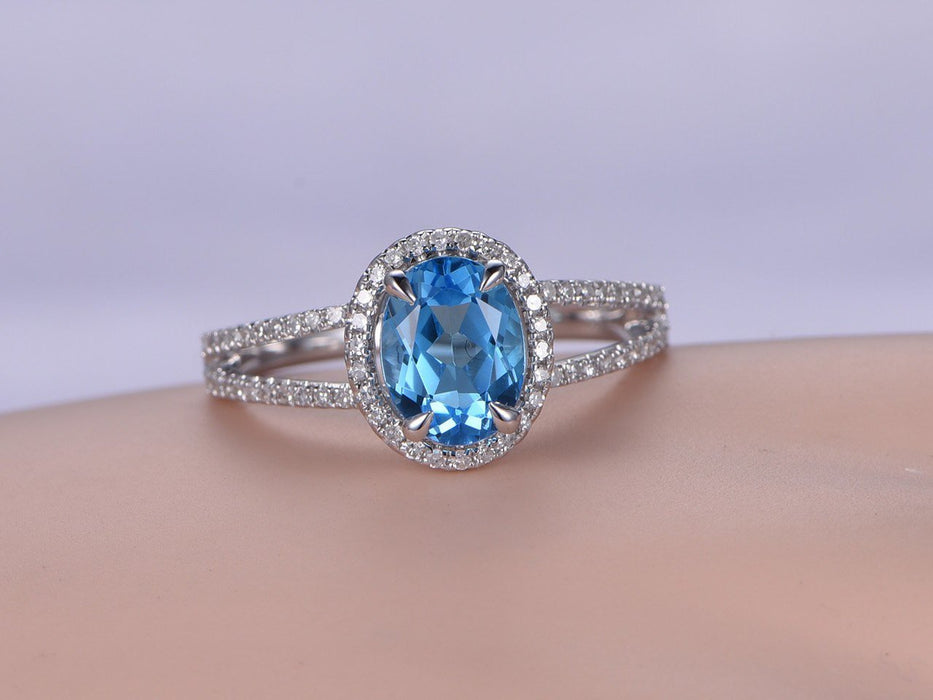 1.50 Carat Oval Sky Topaz and Diamond Halo Split Shank Engagement Ring in White Gold
