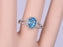 1.50 Carat Oval Sky Topaz and Diamond Halo Split Shank Engagement Ring in White Gold