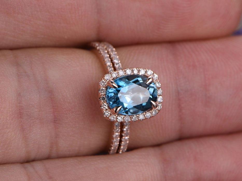 2 Carat Oval Cut London Blue Topaz and Diamond Halo Wedding Ring Set in Rose Gold