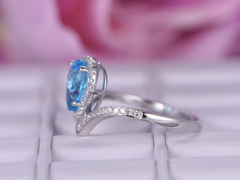 1.25 Carat Pear Cut Sky Topaz and Diamond Unique Curved Engagement Ring in White Gold